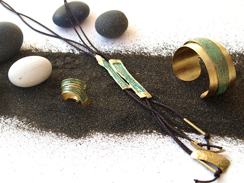 jewellery placed on black soil